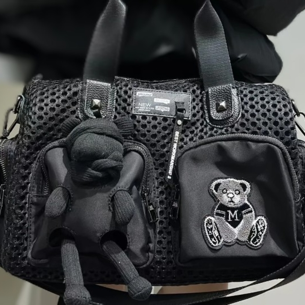 Stylish Black Mesh Handbag with Bear Accents